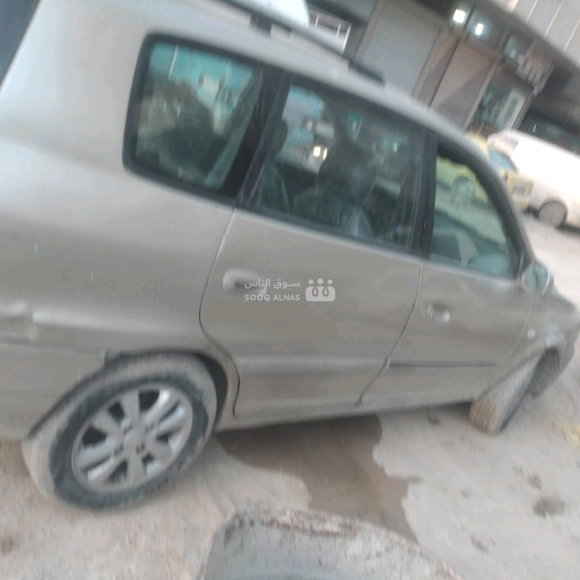 كيا كارينز 2004