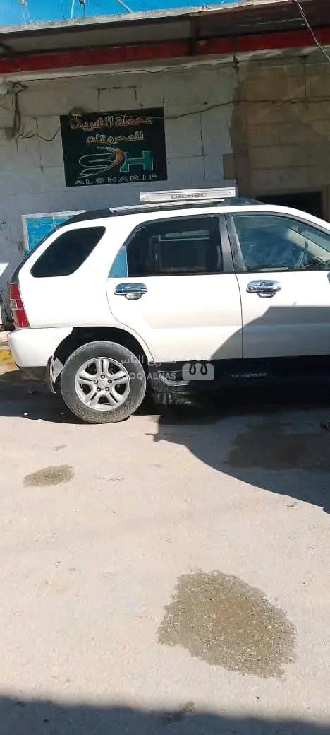 كيا سبورتاج قصه 2005